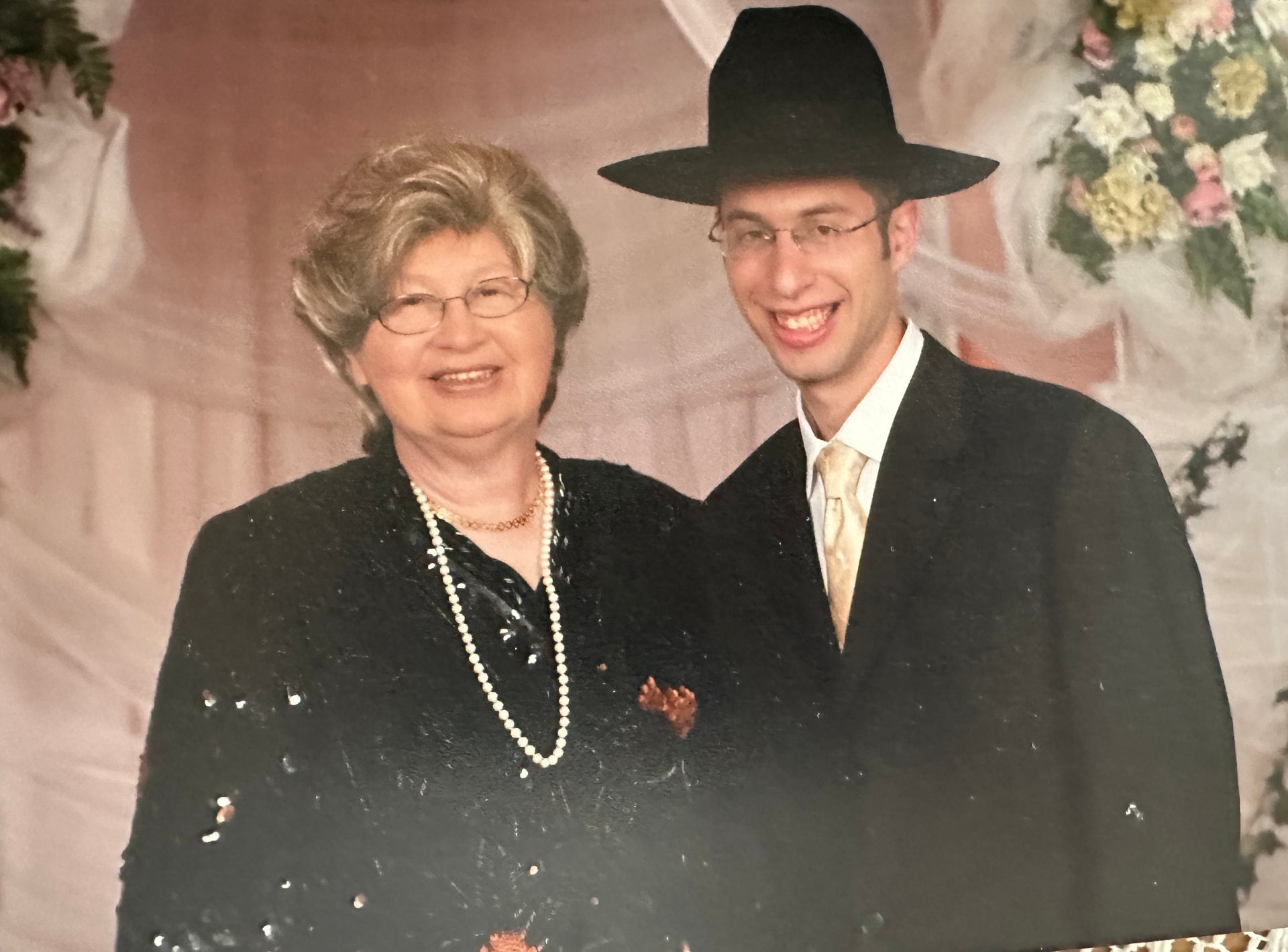 Bobby laughing with her grandson at a family simcha