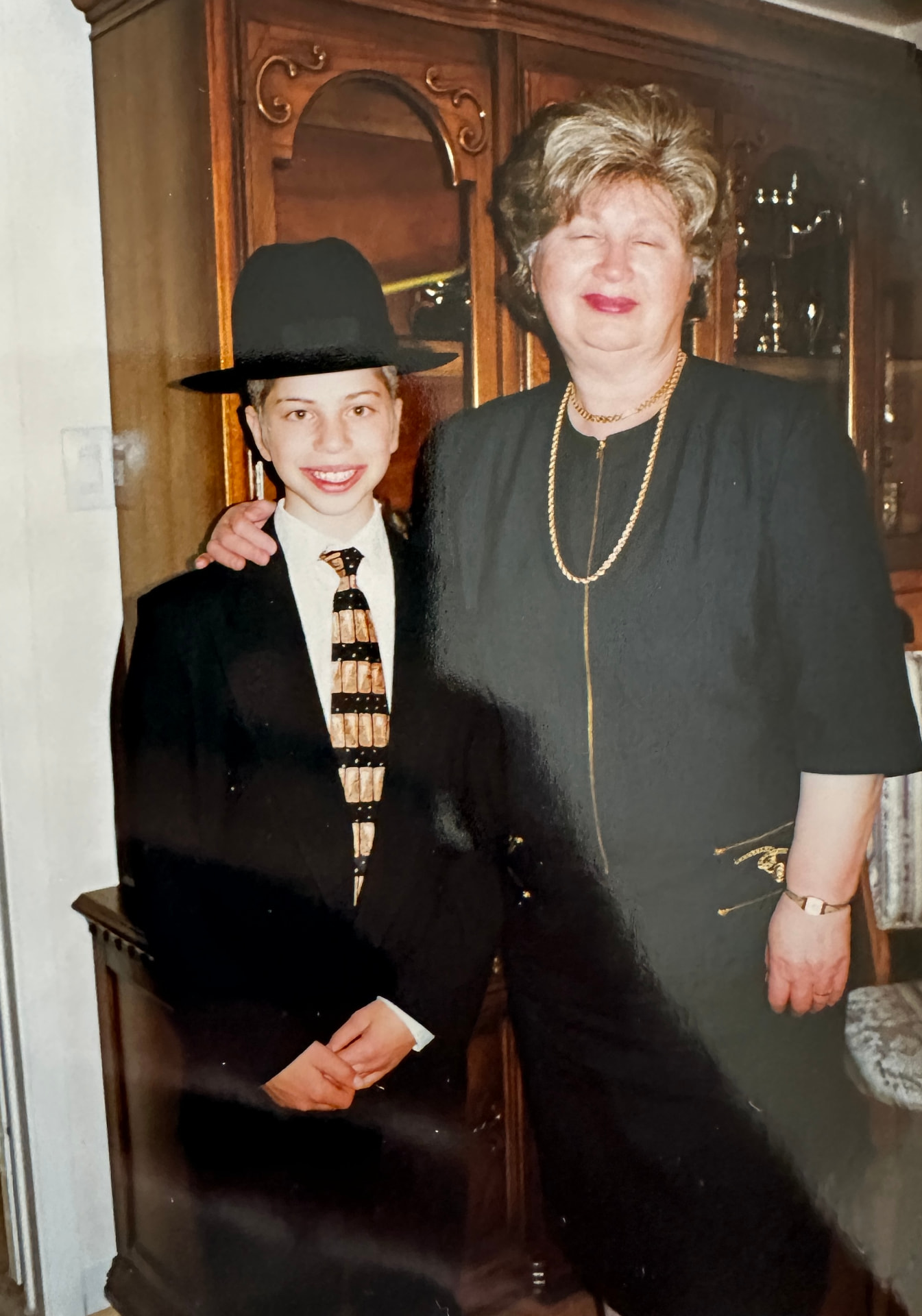 Bobby with her bar mitzvah grandson at home