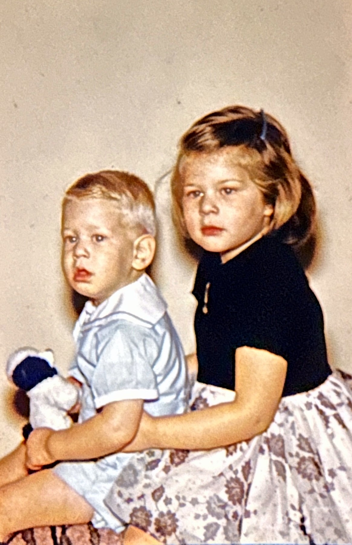 A Rubenstein sister holding her little brother on her lap