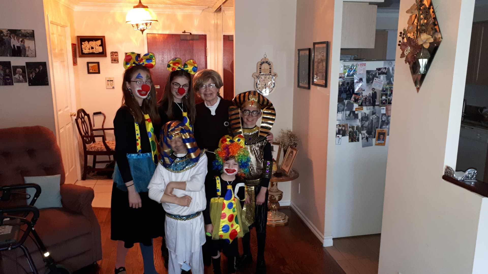 Bobby with the grandchildren in their Purim costumes