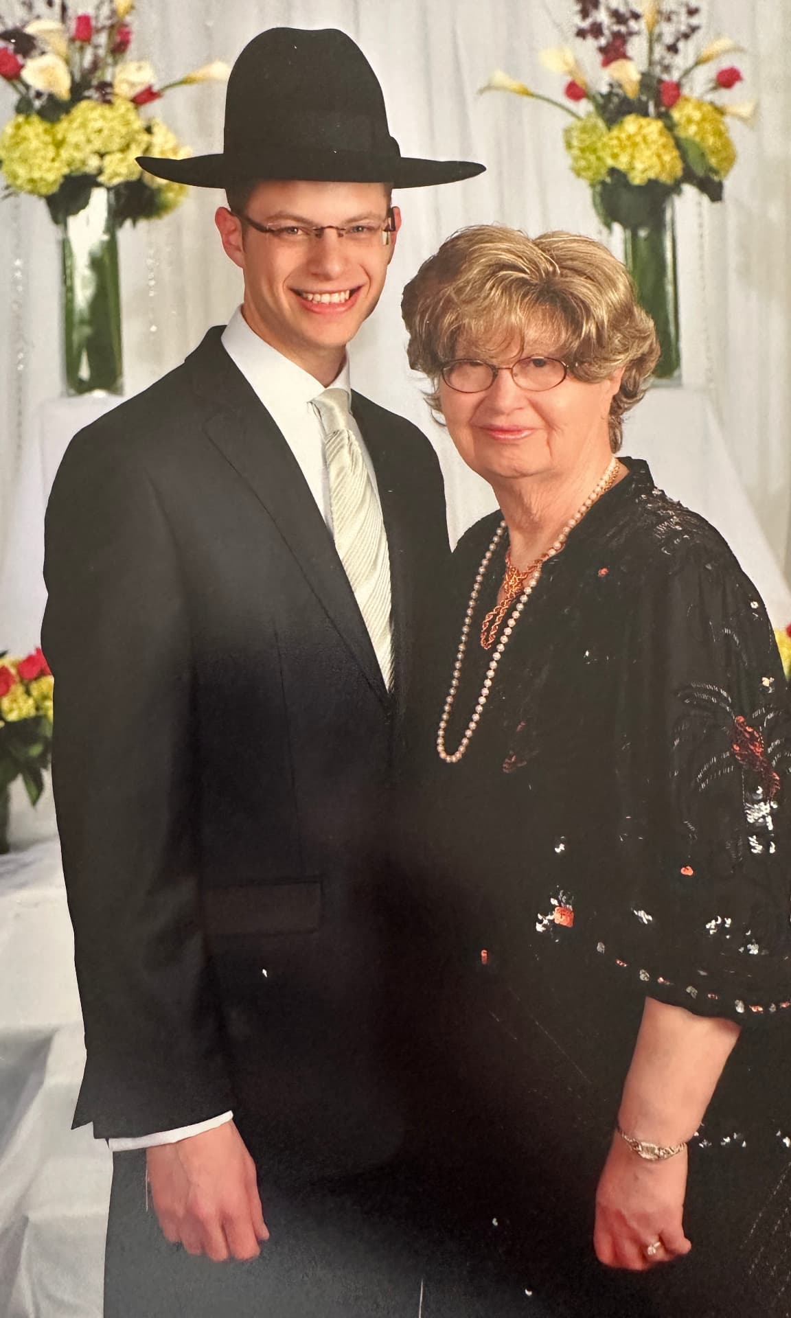 Bobby with her grandson the chosson at a wedding